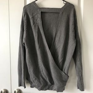 sweater with open back, never worn